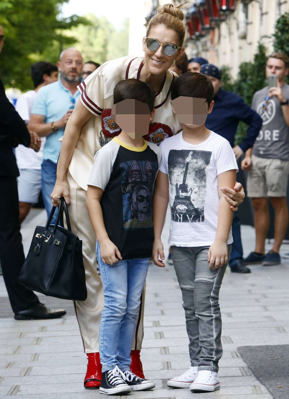 Celine Dion with her twin sons Eddy and Nelson Angélil in Paris