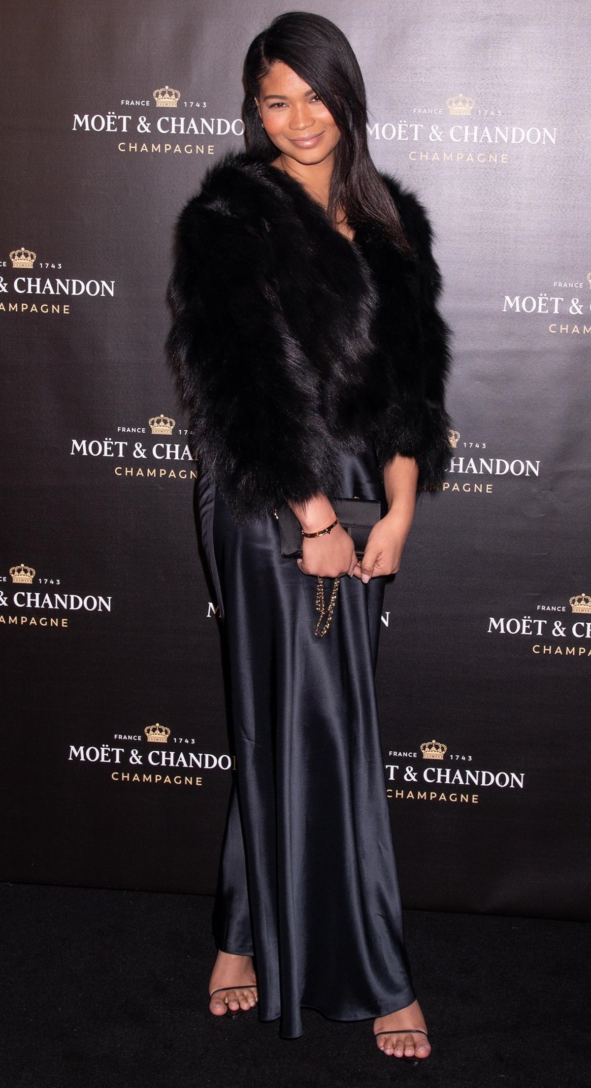 Chanel Iman attends the Moet & Chandon Holiday Season Celebration