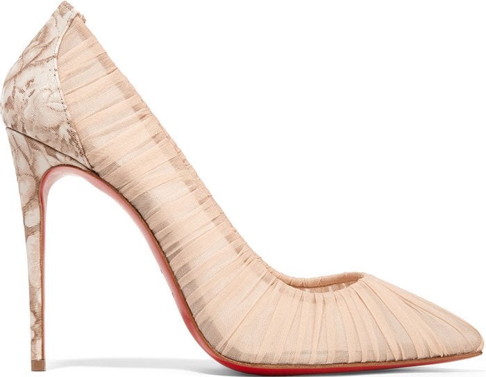 The 'Follie Draperia' pumps by Christian Louboutin have a classic point-toe design and feature beige chiffon folds and a floral-print faille back panel