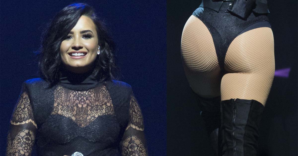 Demi Lovato Flashes Bottom in Black Thigh-High Boots.
