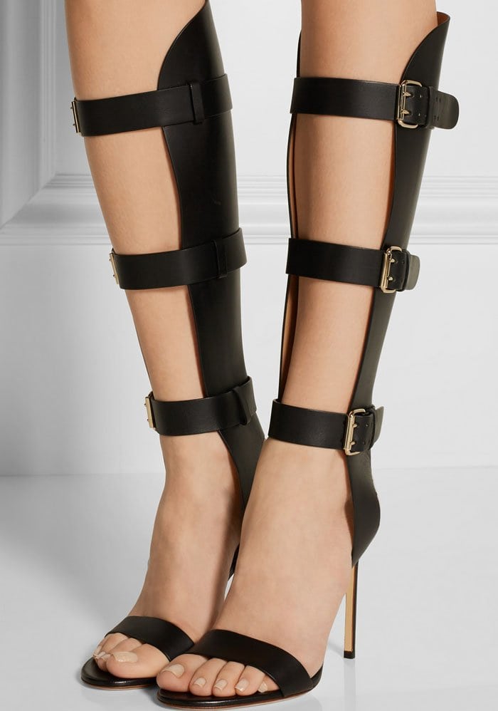 Francesco Russo's statement sandals are crafted from smooth black leather in a gladiator-style silhouette