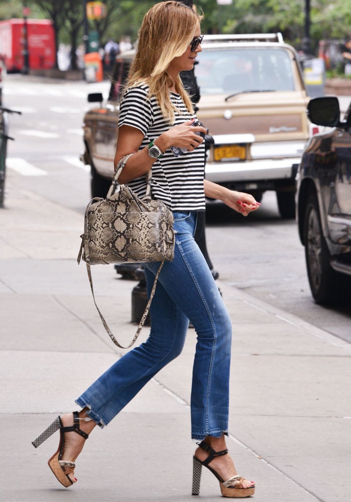 Heidi Klum switches AMO Denim ensembles during a day out in Tribeca