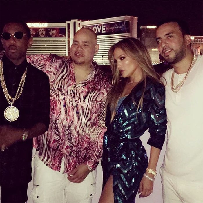 Jennifer Lopez flanked by Fat Joe and French Montana at her birthday party