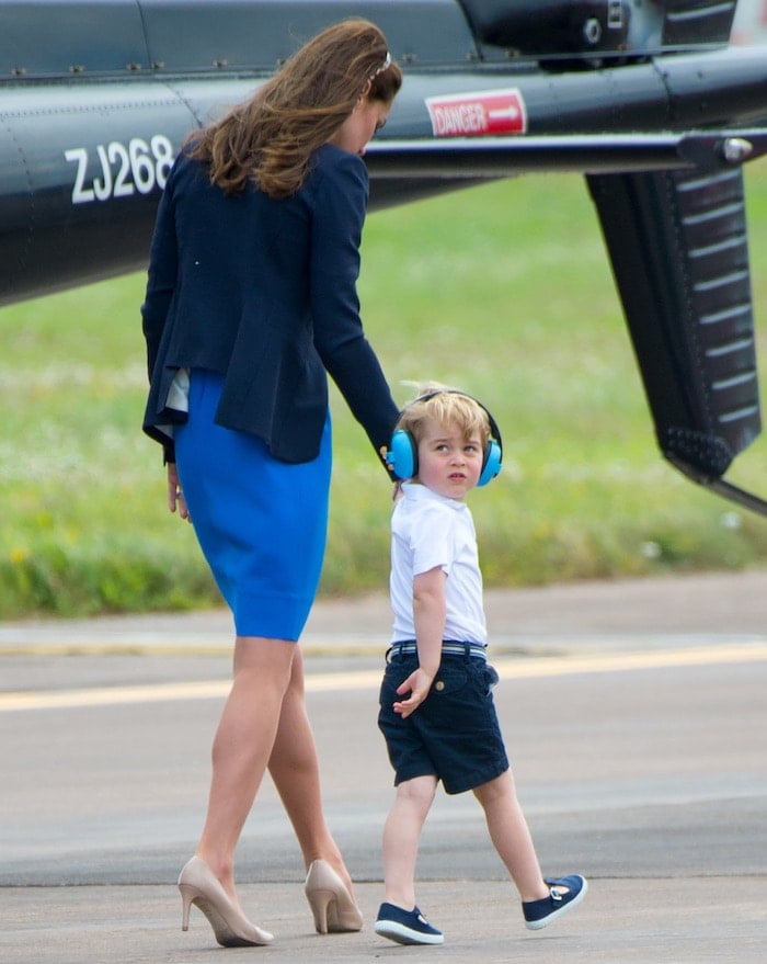 Kate Middleton wears her hair down as she escorts her son, Prince George, to the International Air Tattoo