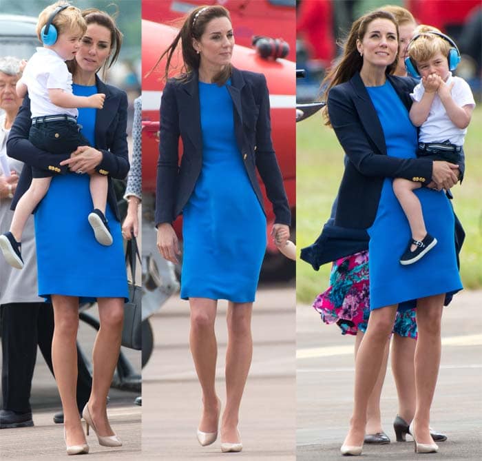 Kate Middleton holds son Prince George at the Royal International Air Tattoo