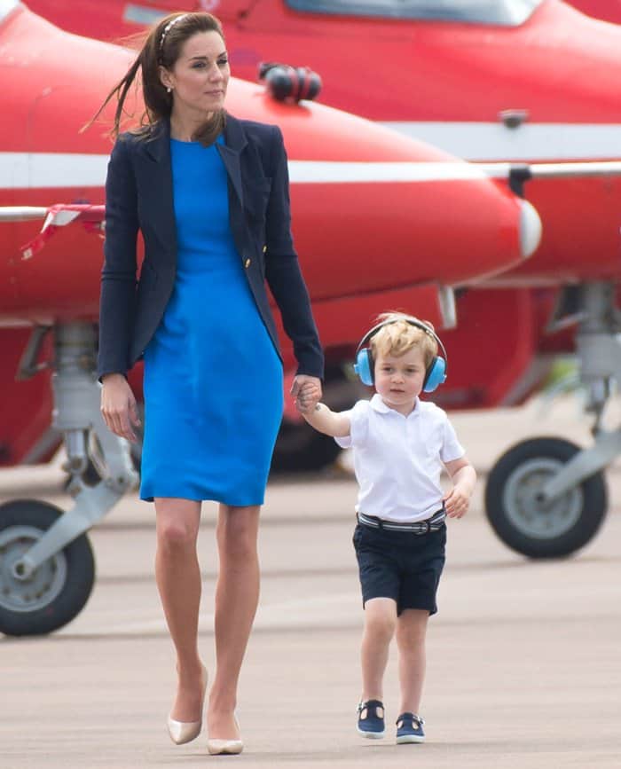 Holding hands with her son, Prince George, Kate Middleton radiated loveliness in a meticulously designed Stella McCartney blue dress known as the 'Ridley' stretch cady dress – an embodiment of sophistication befitting a casual royal outing
