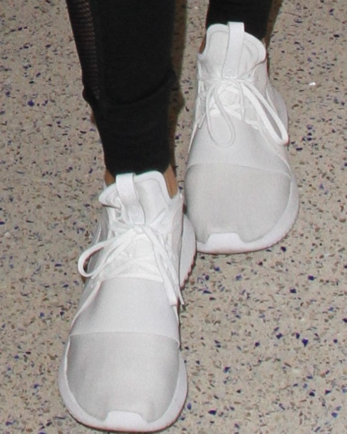 Kendall Jenner's Adidas Tubular Defiant sneakers in white