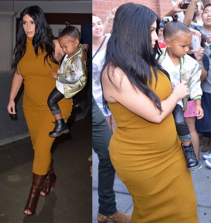 Kim Kardashian flaunting her baby bump in a Laquan Smith Fall 2015 mustard rib dress