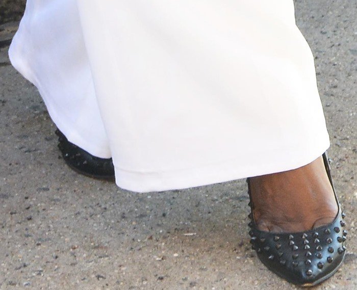 Laverne Cox's feet in studded black pumps