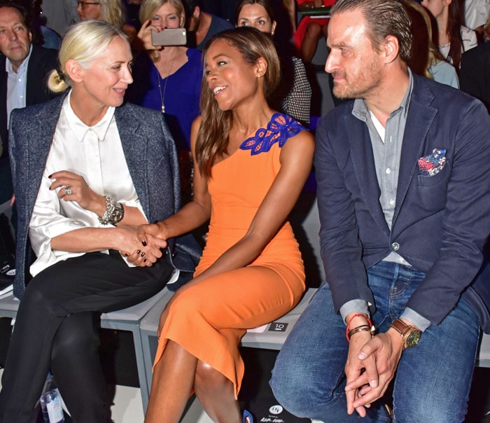 Editor in chief of Vogue, Christiane Arp, Naomi Harris in a colorful Victoria Beckham dress, and John Cloppenburg attend the 'Designer for Tomorrow' during the Mercedes-Benz Fashion Week Berlin Spring/Summer 2017