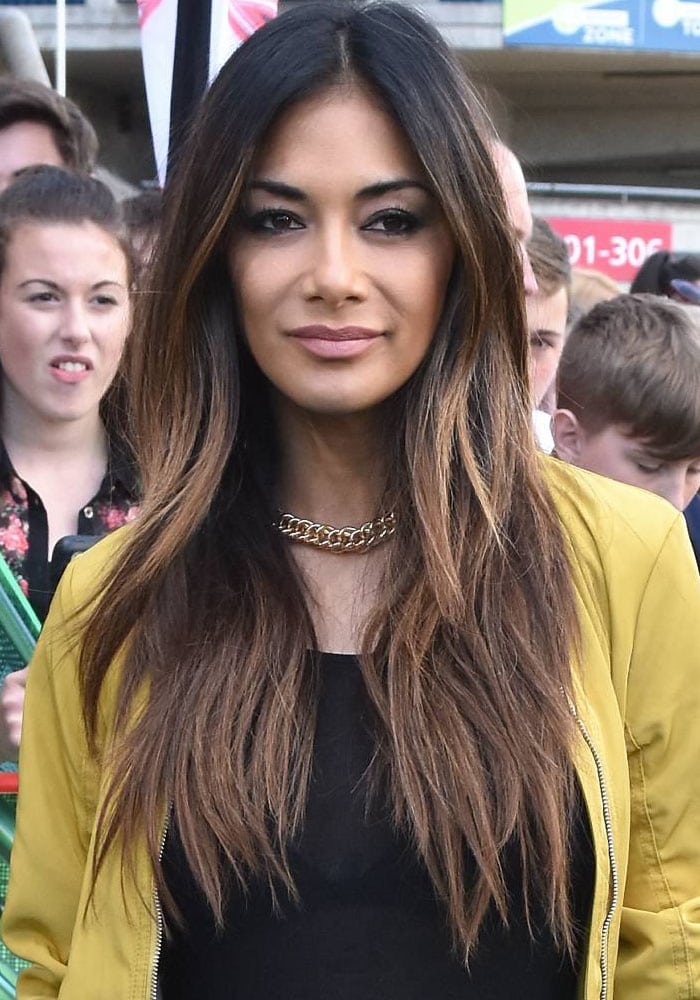 Nicole Scherzinger curls her hair as she arrives at Croke Park for the 2016 "X Factor" Dublin auditions