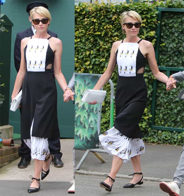 Portia de Rossi effortlessly blends elegance with modern edge in a black-and-white geometric cut-out dress, styled with chic ankle-strap flats and a matching white clutch at Wimbledon 2016