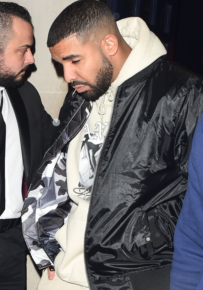 Drake leaves a London nightclub a few minutes after Rihanna