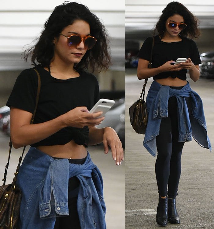 Vanessa Hudgens wore her dark locks in natural curls and completed the look with deep red lipstick