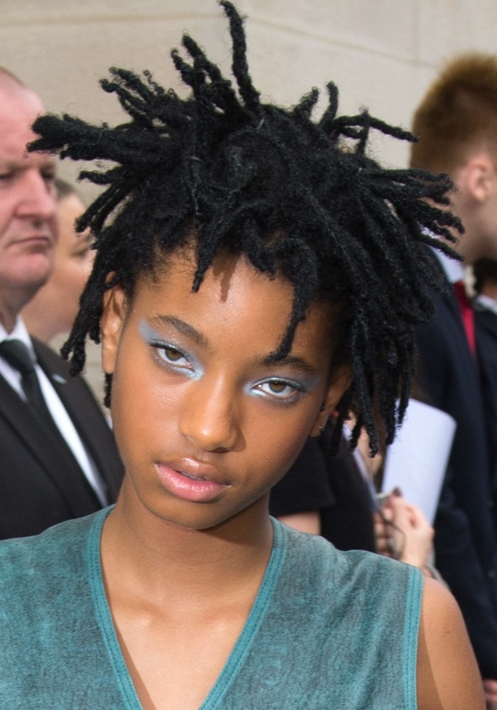 Willow Smith poses for photos outside of the Chanel Haute Couture Show
