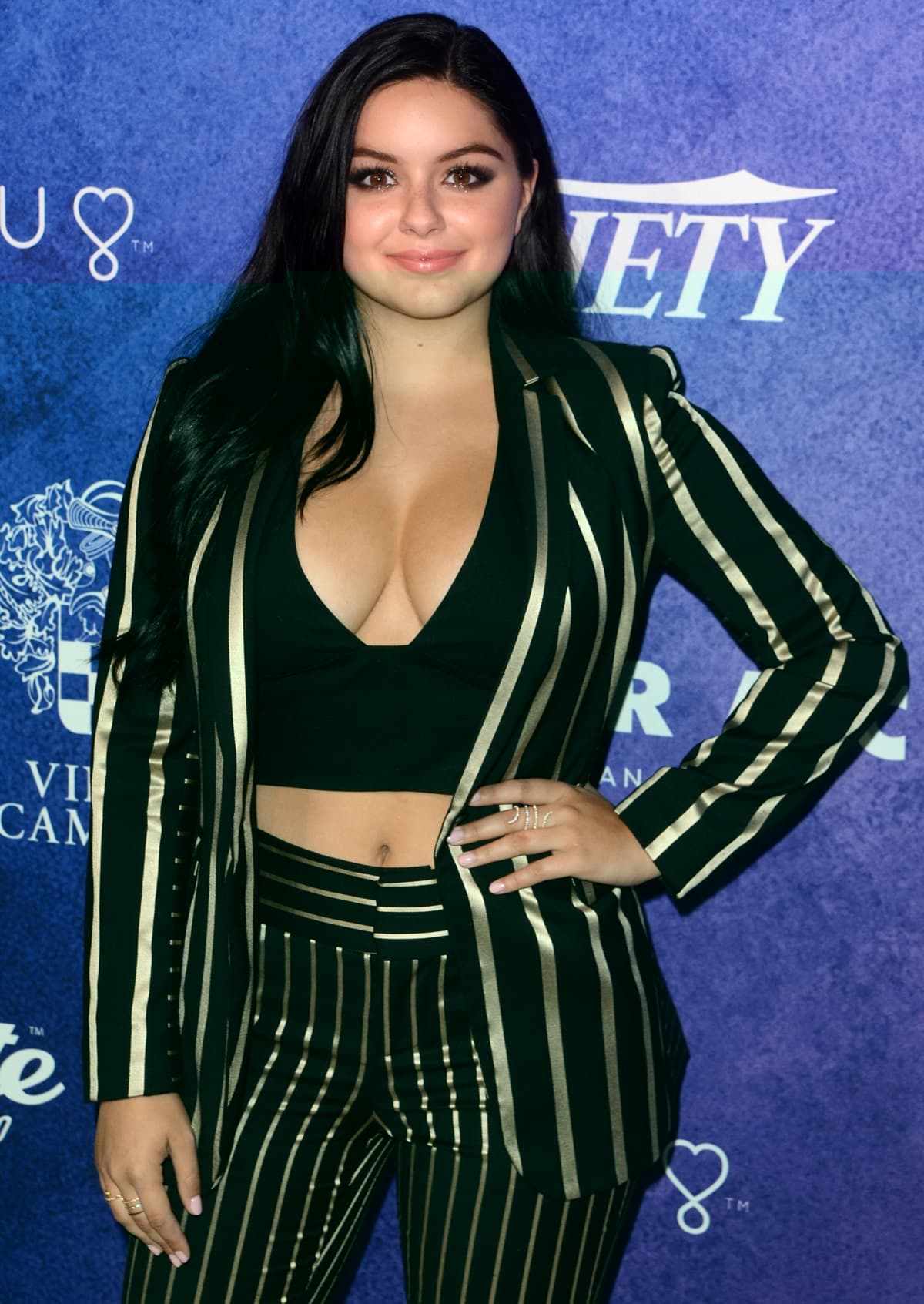 Ariel Winter, known for her revealing Instagram posts, faces both criticism and praise for her outfits, but she insists she shares moments of her life without strategy