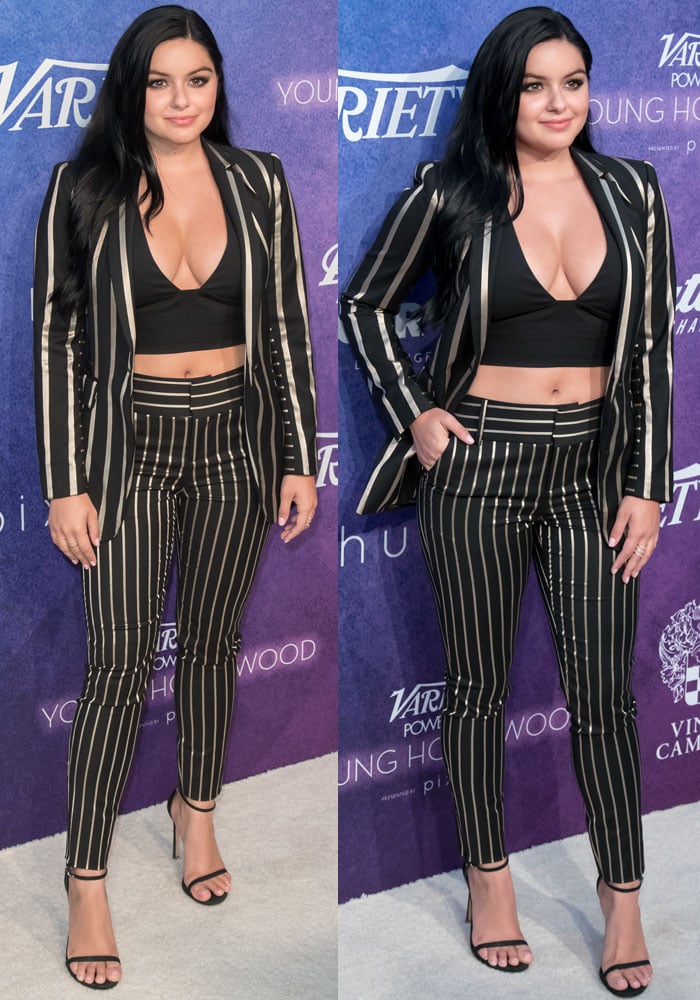 Ariel Winter shows off her cleavage in a black top paired with a striped Alice + Olivia suit
