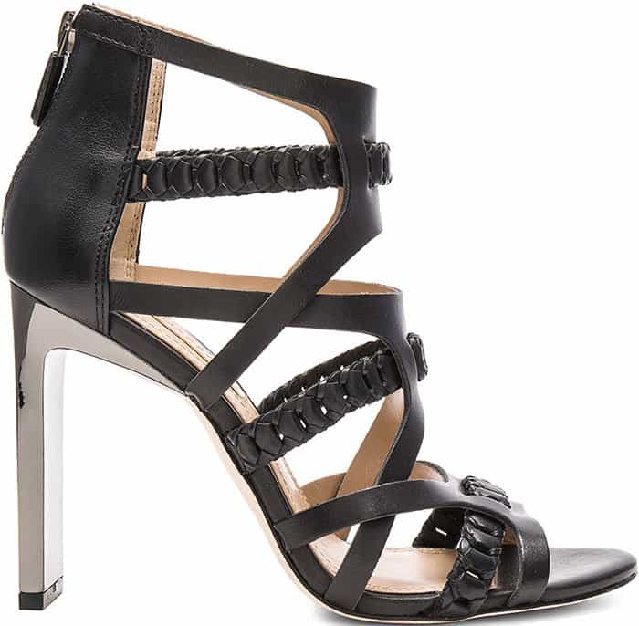 Chain-woven leather straps modernize a strappy sandal set atop a dramatic, rectangular heel with an eye-catching brushed-metal finish