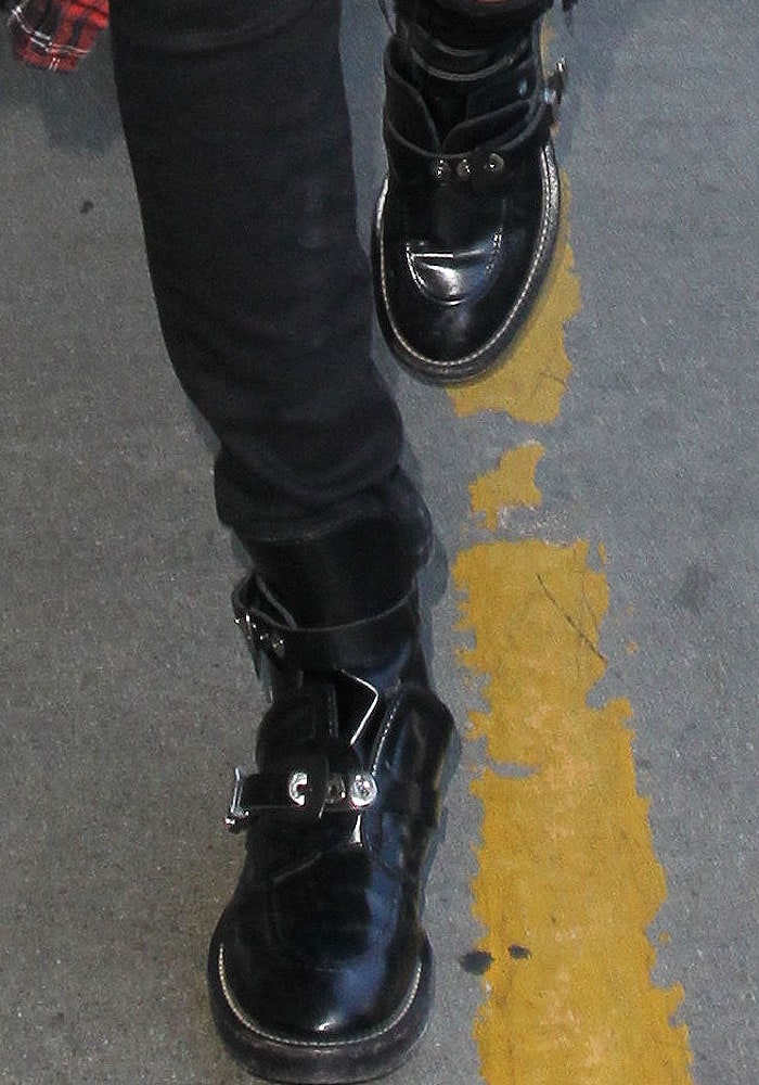 Bella Hadid wears a pair of buckled Balenciaga boots
