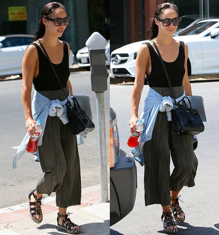 Cara-Santana-black-top-loose-pants-lace-up-sandals