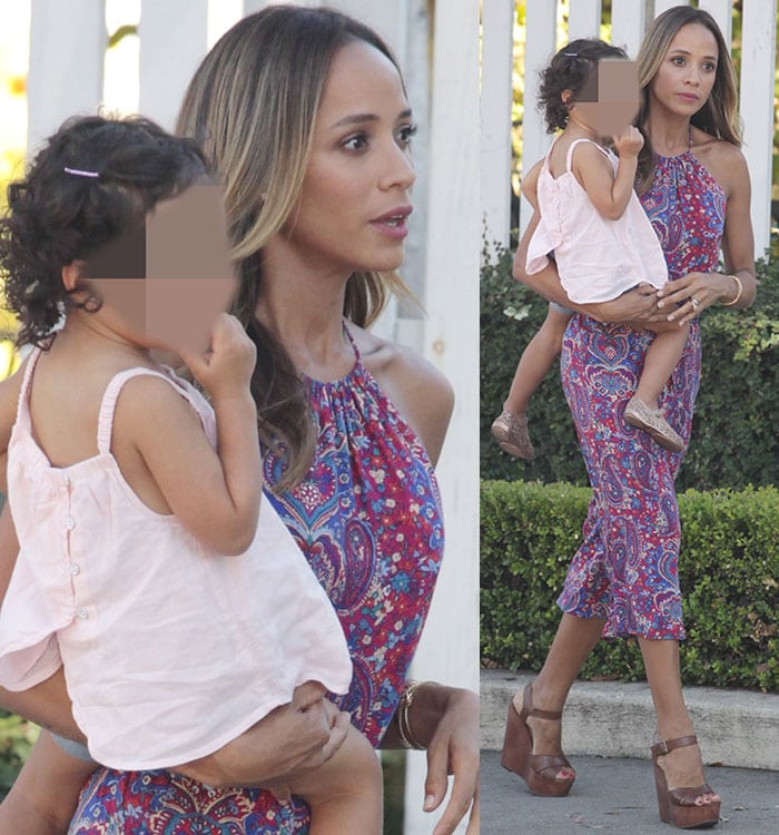 Dania Ramirez wears a colorful paisley-print jumpsuit during an excursion with her twins