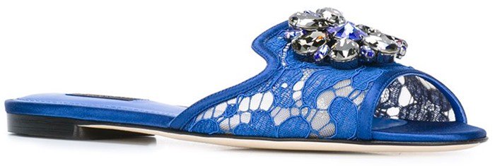 Blue silk-cotton blend and leather 'Bianca' sliders from Dolce & Gabbana featuring an open toe, a floral lace pattern, rhinestone embellishments, a branded insole, a leather insole, and a leather sole