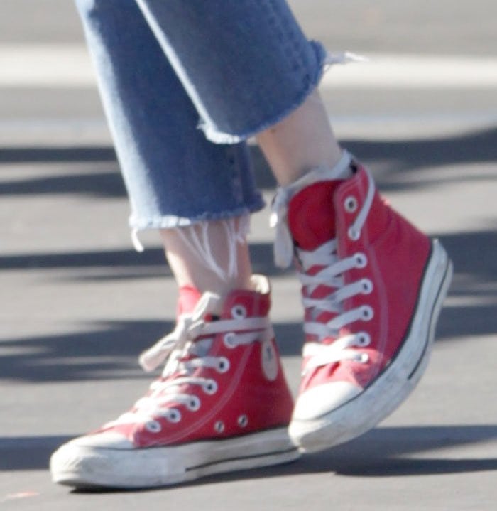 Emma Roberts wears red Converse Chuck Taylor “All-Star” sneakers