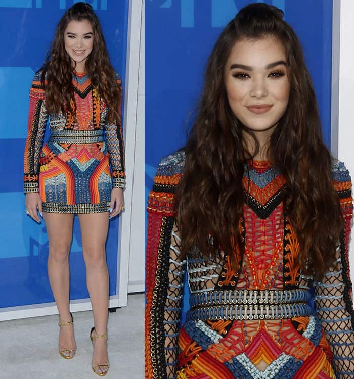 Hailee Steinfeld looks fun and age appropriate in a colorful beaded Balmain dress