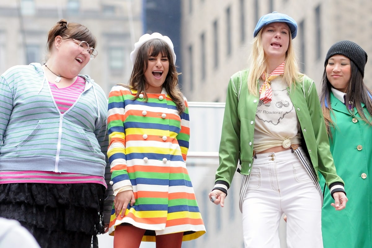 Lea Michele, Heather Morris, Jenna Ushkowitz, and Ashley Fink rehearse a scene at the "Glee" set in Times Square