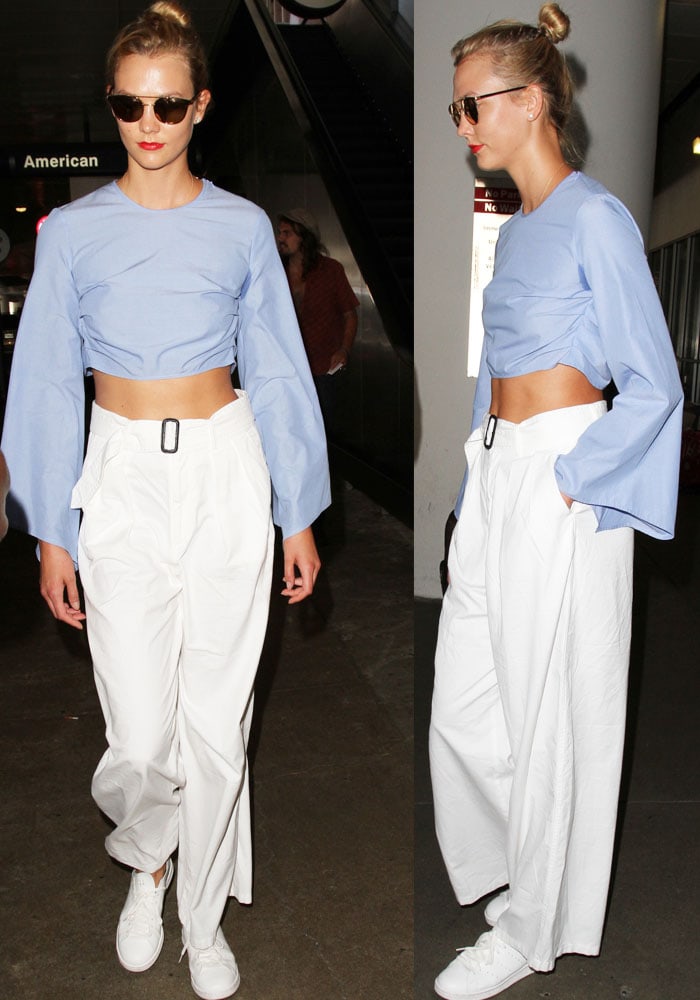 Karlie cuts clean, chic lines in a cropped bell-sleeved top by Rosie Assoulin paired with wide-leg pants by Tomorrowland