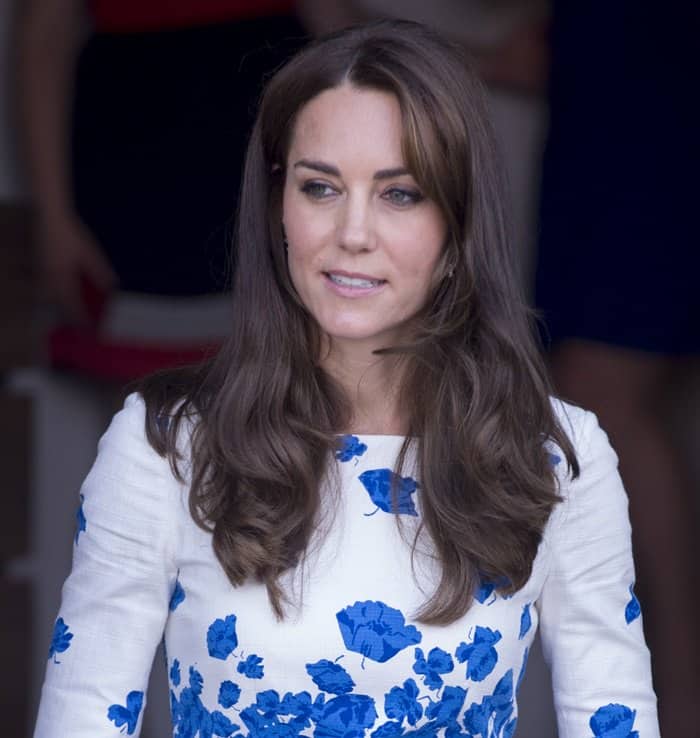 Kate Middleton's signature loose waves and natural makeup perfectly complement her floral L.K. Bennett dress
