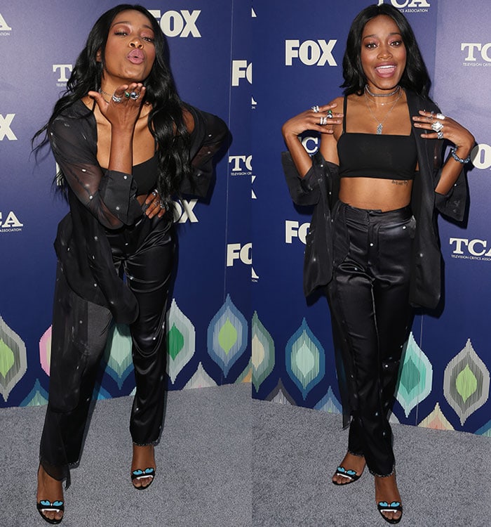 Keke Palmer made a striking statement in her ensemble at the event, donning a Baja East sheer top paired with matching satin pants