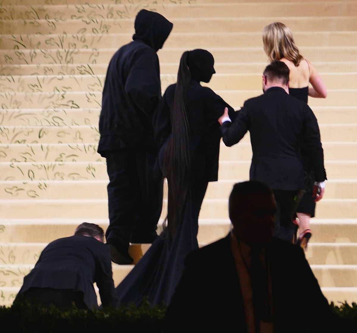 Kim Kardashian arrives in a full black bodysuit covering her entire face at the 2021 Met Gala in New York City