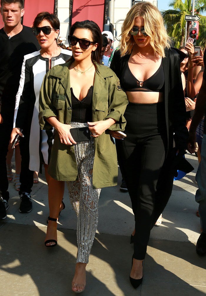 Kris Jenner, Kim Kardashian and Khloe Kardashian hide behind sunglasses while filming their reality show