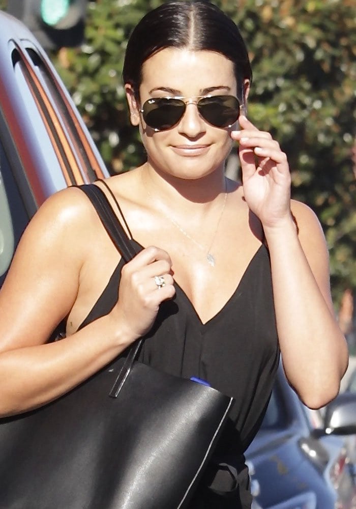 Lea Michele wears her hair back as she attends a massage session at The Now Massage Boutique