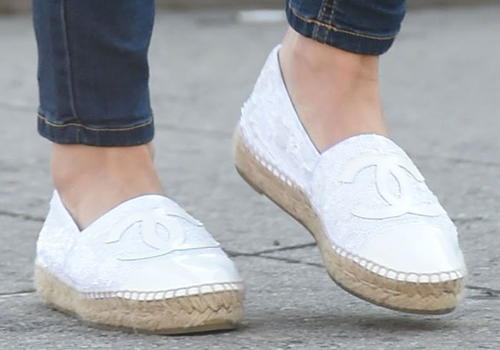 Lucy Hale styles skinny jeans with white Chanel espadrille loafers