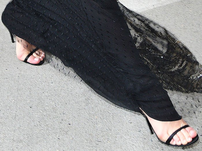 Margot Robbie shows off her feet in Jimmy Choo 'Minny' black satin sandals