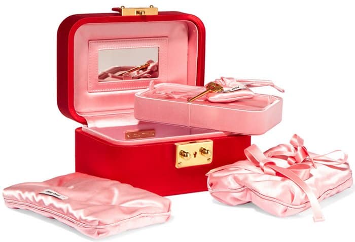 Detailed view of the Miu Miu satin jewelry box’s plush interior, perfect for protecting delicate treasures