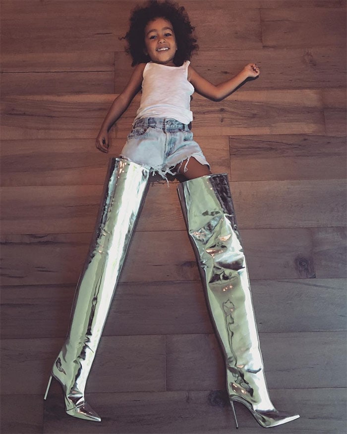 North West Kim Kardashian silver boots