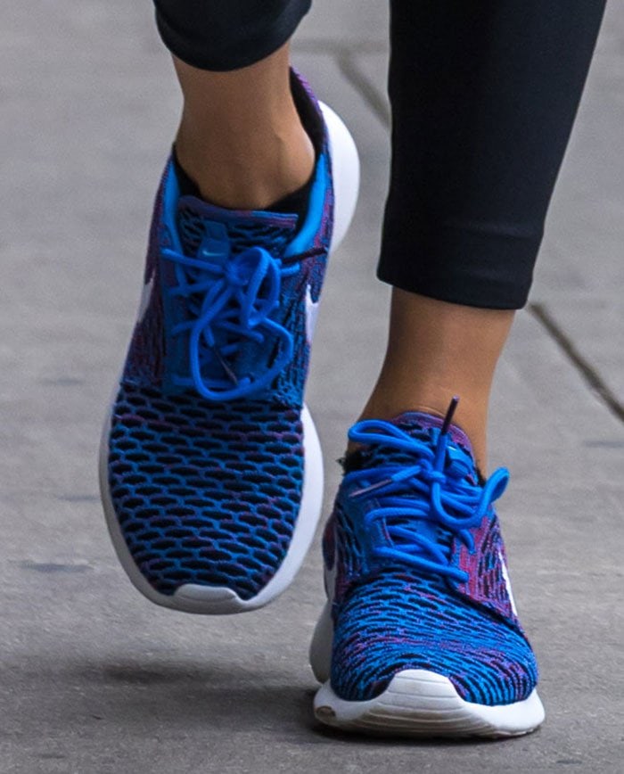 Olivia Palermo wears blue "Roshe One" Flyknit sneakers