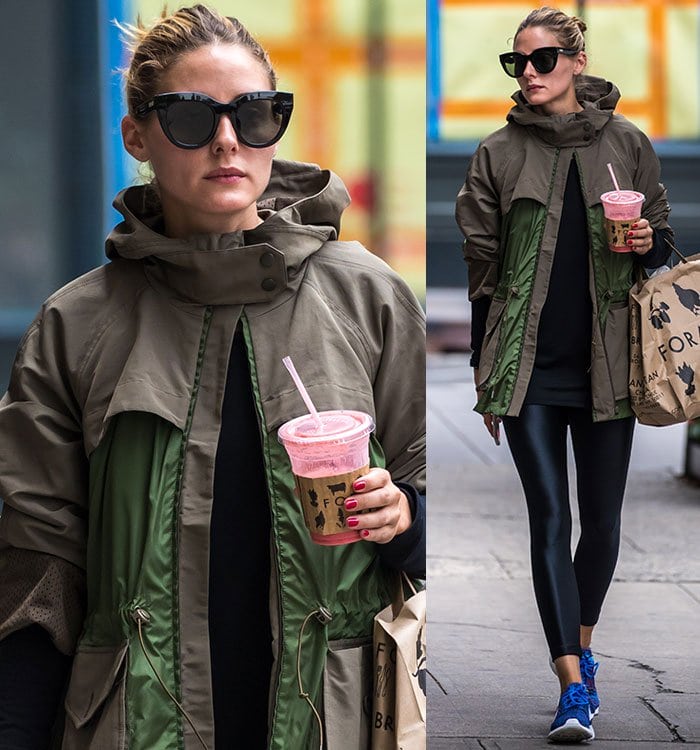 Olivia Palermo wears an army green Moncler jacket with a pair of Perverse sunglasses out in New York City