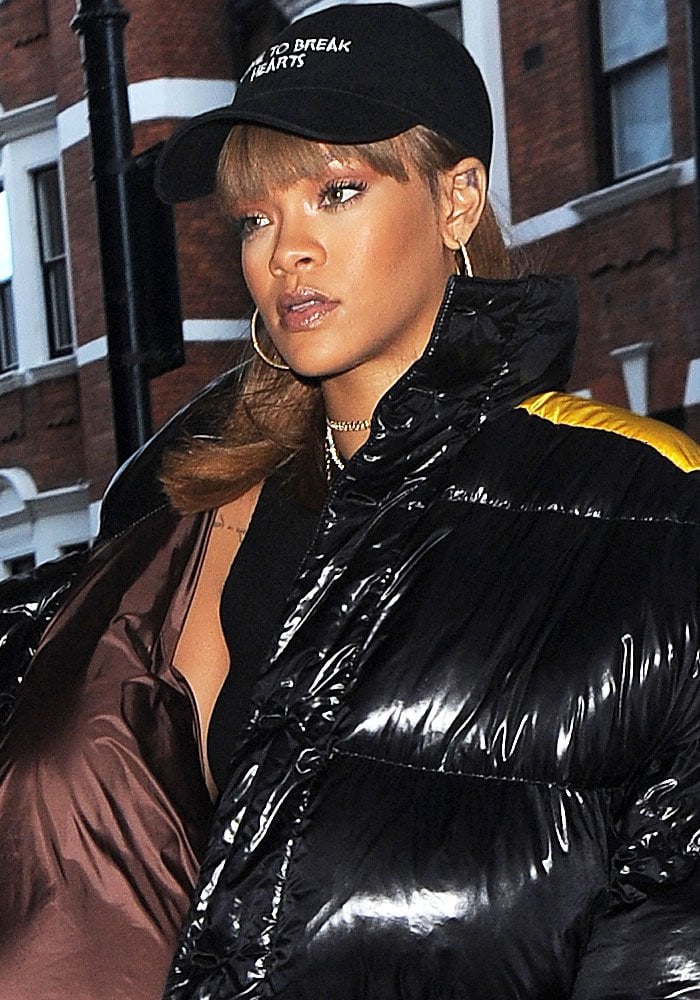 Rihanna tops her hair with a baseball hat while shopping at Harrods