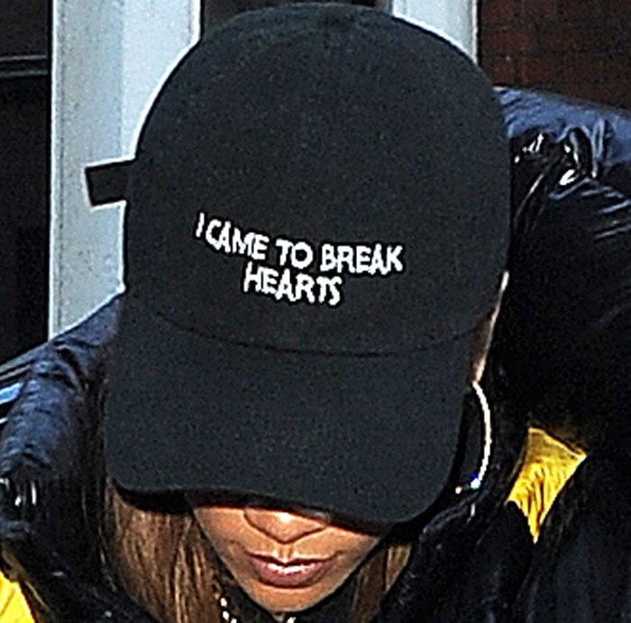 Rihanna wears a Nasa Season hat emblazoned with "I came to break hearts"