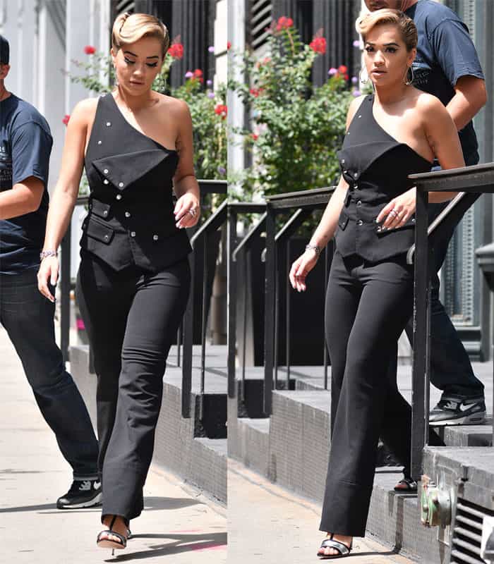 Rita Ora in Antonio Berardi jumpsuit with cascading silver buttons