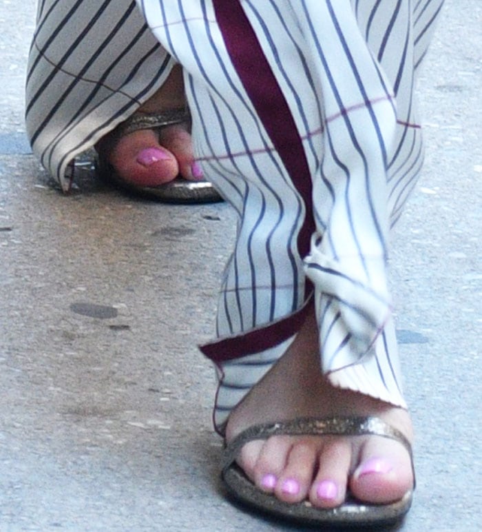 Rita Ora's feet in glittery Stuart Weitzman sandals