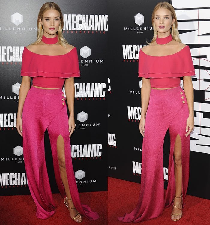 Rosie Huntington-Whiteley shows off her slender frame in pink wide-leg pants from Balmain