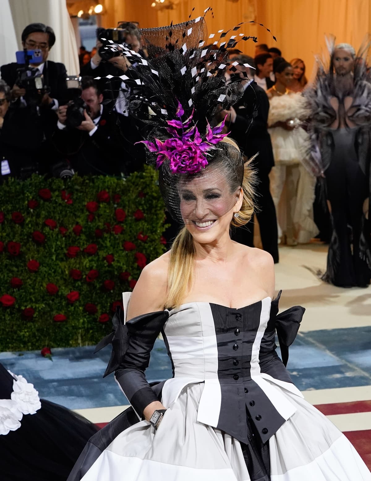 Sarah Jessica Parker completed her look with a colorful Philip Treacy hat and Fred Leighton jewelry
