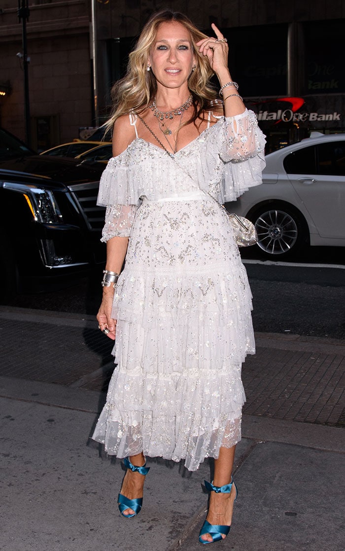 Sarah Jessica Parker in a ruffled Needle & Thread open shoulder dress