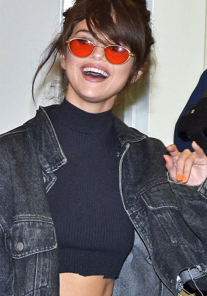 Selena Gomez rocks vintage sunglasses at Narita International Airport in Chiba