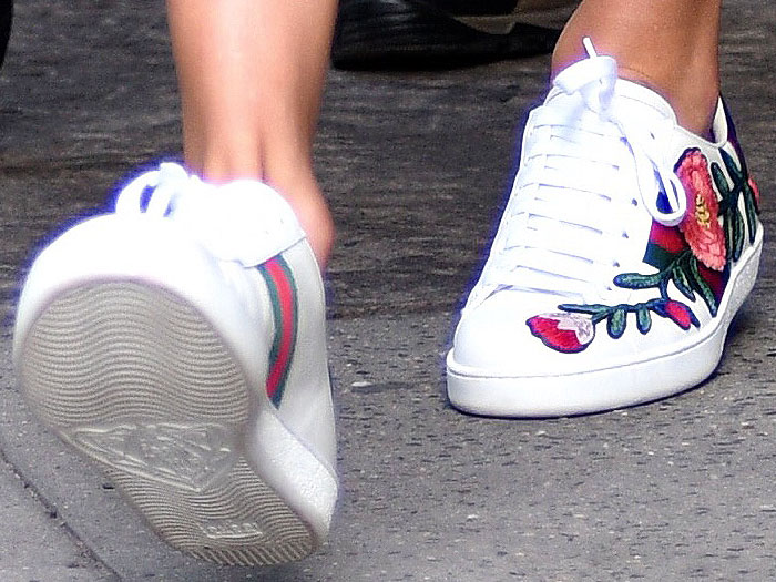 Taylor Swift clean white "New Ace" sneakers during an afternoon out